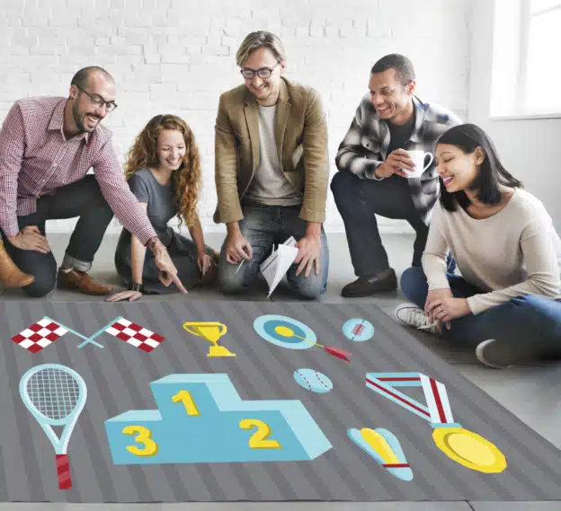équipe de collaborateurs devant un podium